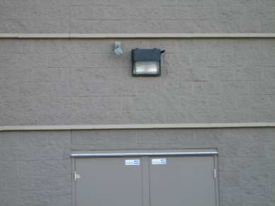 1/4" x 2" round head stainless steel sleeve anchor - block - outside light fixture