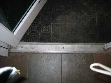 1/4" x 1-1/4" flat 410 Stainless Steel tapcon - concrete - door threshold